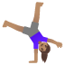 woman cartwheeling, medium skin tone